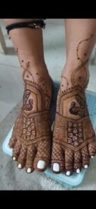 Peacock bridal leg mahendi designs by pooja chavda mehendi art